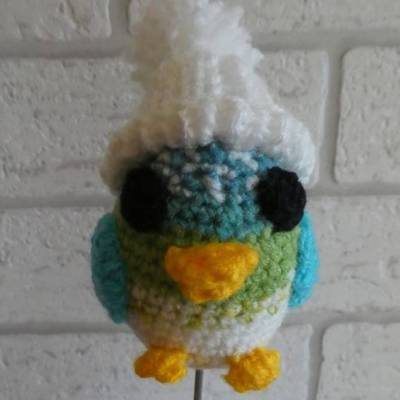 Blumenstecker / Pflanzenstecker Vogel mit Pudelmütze (weiß/grün/türkis)