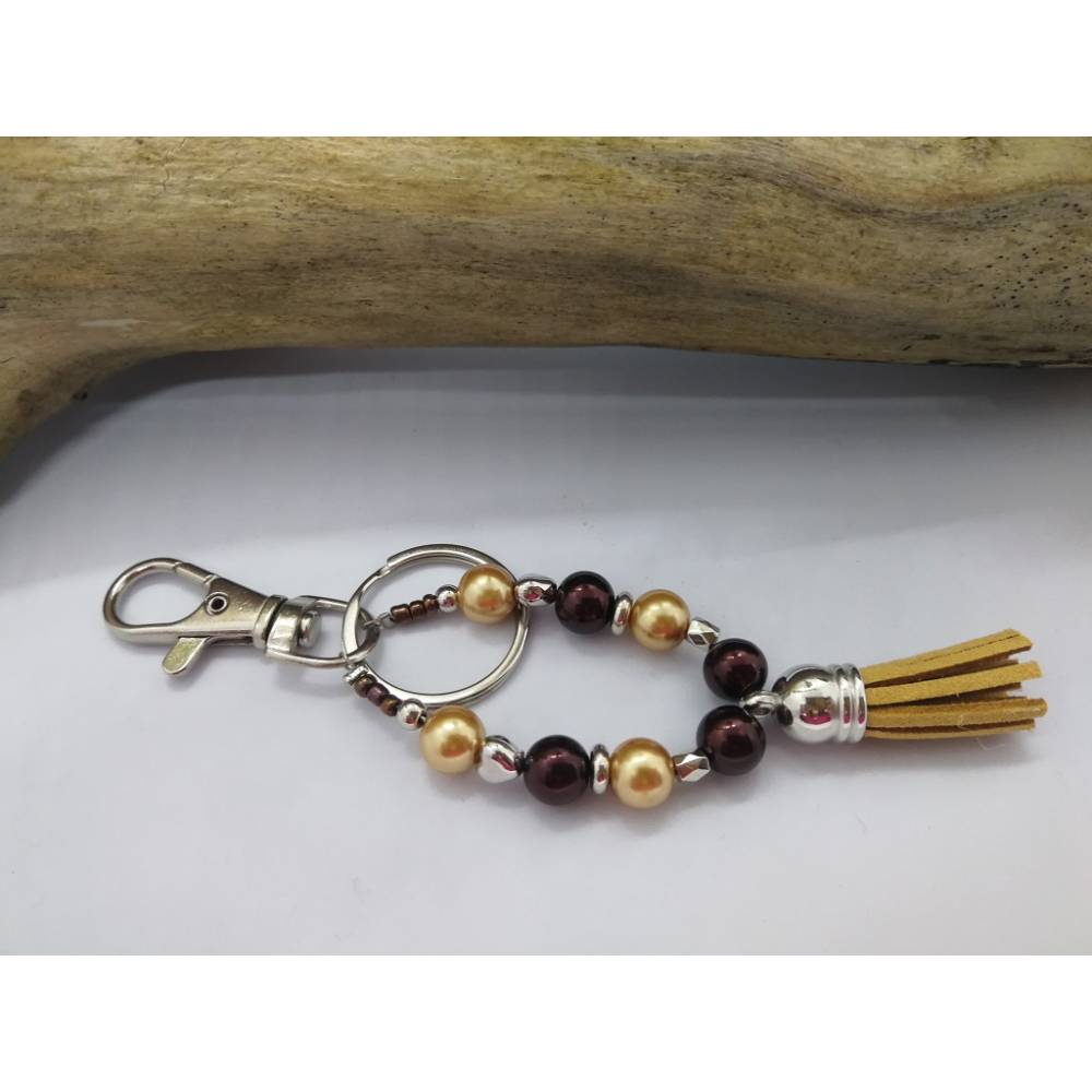 Personalisierbarer Schlüsselanhänger Tropfenform Braun-Gold – Unikat von derWolltiger Bild 1