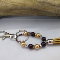 Personalisierbarer Schlüsselanhänger Tropfenform Braun-Gold – Unikat von derWolltiger