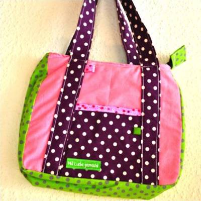 Schicke, kleine Mädchenhandtasche, bunt mit Punkten