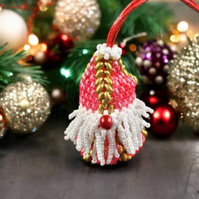 : Entdecken Sie 7 cm große Weihnachtswichtel mit befüllbarem Anhänger in rot für einzigartige Geschenke