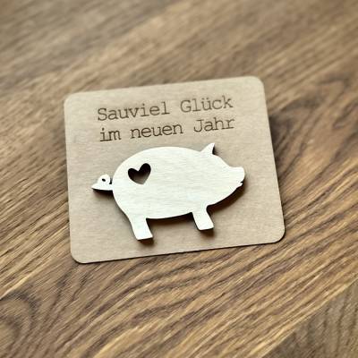 Glücksschwein, Glücksbringer Schwein, Holz auf Kraftpapier