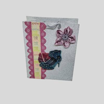 Stilvolle silberne Glitter-Geschenktasche mit 3D-Motiv