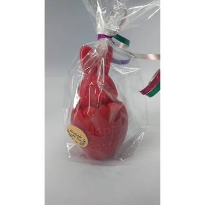 Frohe Ostern Kerze, Hase im Osterei, verschiedene Farben