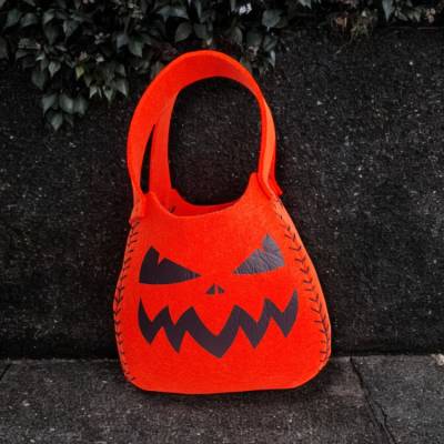 Halloween Beutel aus Filz mit Kürbisgesichtern