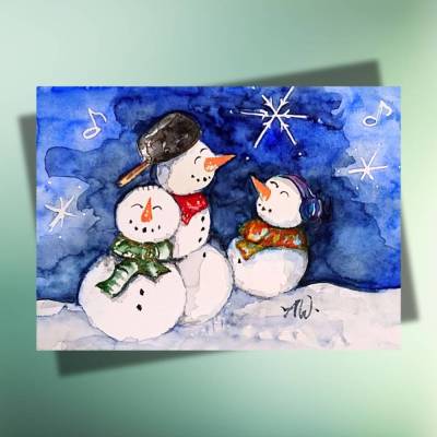 Weihnachtskarte mit drei singenden Schneemännern – fröhliche Postkarte auf Kraftpapier