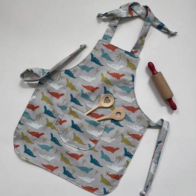 VERSANDFERTIG! Kinderschürze DINOSAURIER – doppellagig, wendbar & waschbar, Geschenkidee für kleine K&uu