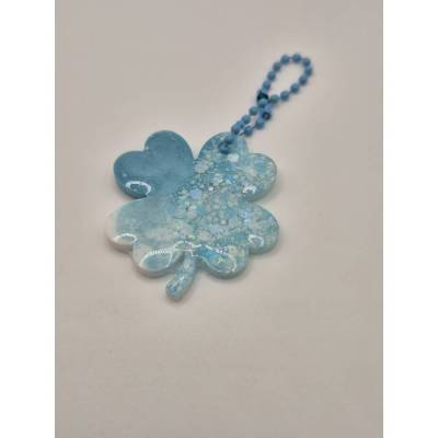 Funkelnder Glücksbringer Kleeblatt Schwarz-Holo Hellblau-weiß