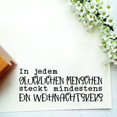 Stempeltext: "In jedem glücklichen Menschen steckt mindestens ein Weihnachtskeks"