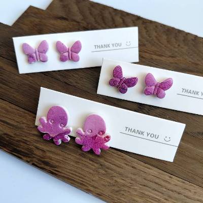 Stecker Ohrringe Schmetterling/Krake lila – handgemacht aus PolymerClay & Edelstahl