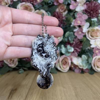 Einkaufswagenlöser Löwe mit Blumen