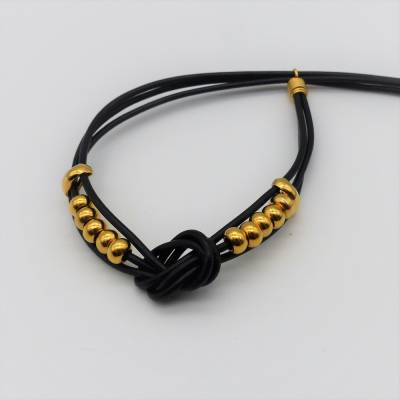 Lederarmband, Armband aus Leder, Metall und Leder, schwarz + gold, Armschmuck unisex, Herren, Damen, Schmuckdesign