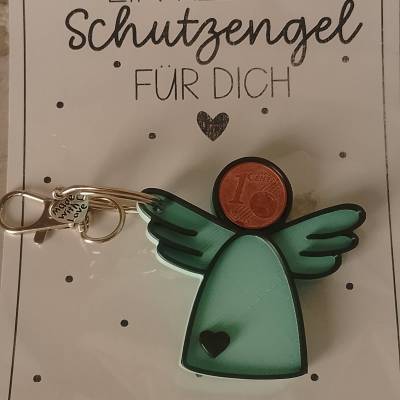 Schlüsselanhänger und Glücksbringer in Form einesSchutzengel
