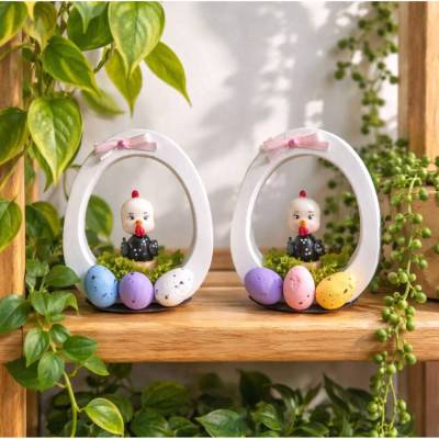 Osterdekoration - Osterei mit Schleife und Osterküken