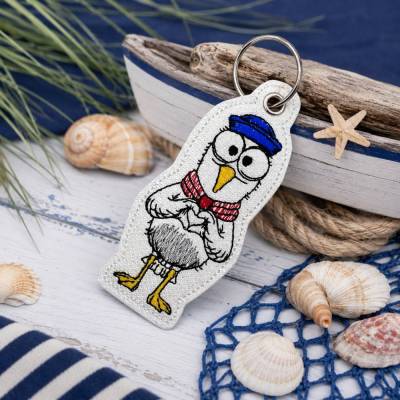 Schlüsselanhänger Coole Möwe mit Herz / Gestickt / Taschenbaumler /