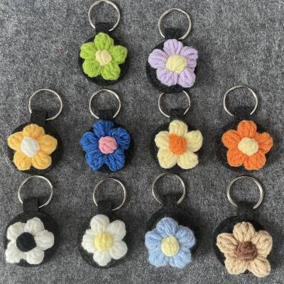 Schlüssel-/Taschenanhänger mit Blumen-/Stern Applikation, Blau rot