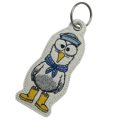 Schlüsselanhänger Möwe mit Gummistiefeln / Gestickt / Taschenbaumler / Stickerei / Besondere Geschenkidee