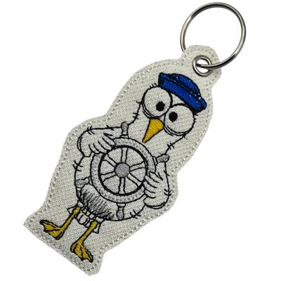 Schlüsselanhänger Möwe mit Steuerrad / Gestickt / Taschenbaumler / Stickerei / Besondere Geschenkidee