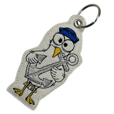 Schlüsselanhänger Möwe mit Anker / Gestickt / Taschenbaumler / Stickerei / Besondere Geschenkidee