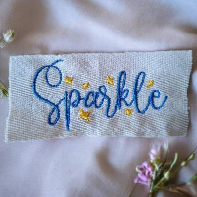 Besticktes webband/label „Sparkle“ – liebevolles Detail für Kleidung, Taschen & DIY Projekten - 50mm breit