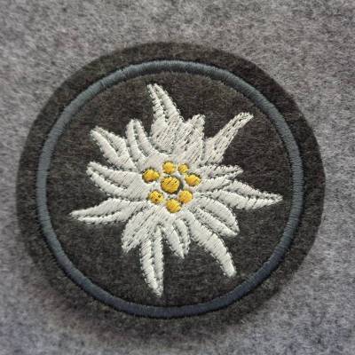 Applikation / Aufnäher rund mit gest. Edelweiss