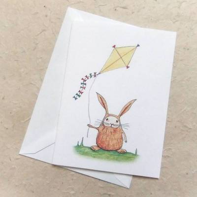 Osterkarte, Klappkarte DinA 6 mit Umschlag, kleiner Hase mit gelbem Drachen