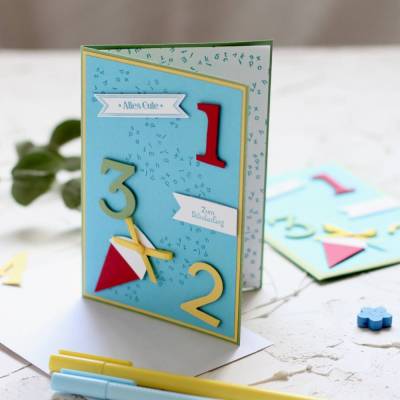 Glückwunschkarte zur Einschulung mit Schultüte & Zahlen zum Schulanfang blau-bunt 1-2-3 Schulkind