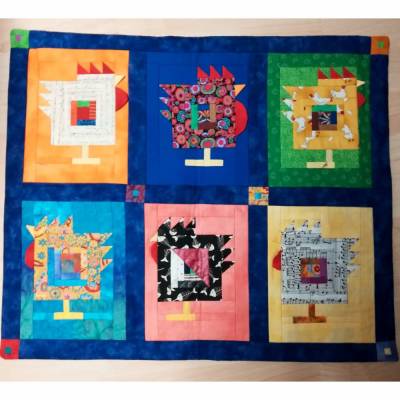 Wandquilt mit Hühner im Log Cabin Muster genäht