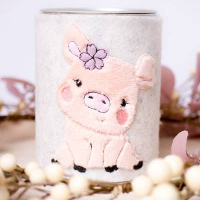 Spardose mit bestickter Filzhülle Glücksschwein