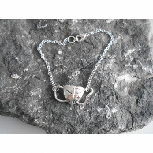 Versilberte Maske,  Armband versilbert 