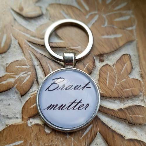 Schlüsselsanhänger Brautmutter schwarz weiß Cabochon silberfarbe Fassung 25mm Gastgeschenk Hochzeit 