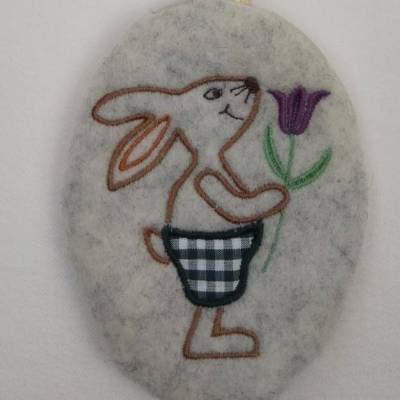 Stickdatei "Hasenjunge mit Blume"