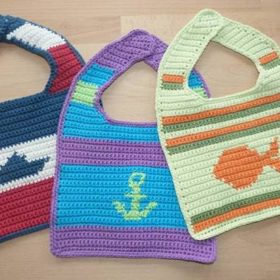Häkelanleitung Lätzchen mit maritimen Motiven, Fisch, Anker, Papierschiffchen, pdf-Datei