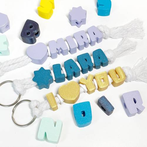 Schlüsselanhänger mit Name oder Wunschtext, personalisiert, 1-farbig - über 50 Farben