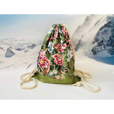 Personalisierbarer Matchbeutel grün mit buntem Blumenmuster – Turnbeutel aus Baumwolle