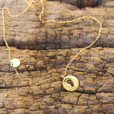 Collier mit Anhänger Babyfüßchen aus Edelstahl goldfarben
