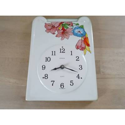 Blumendekorierte Wanduhr mit Quarz-Laufwerk. Kienzle. 27 x 19,5 x 2,5 cm