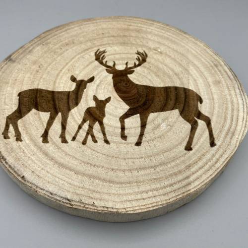 Wandbild aus Baumscheibe mit Hirschen