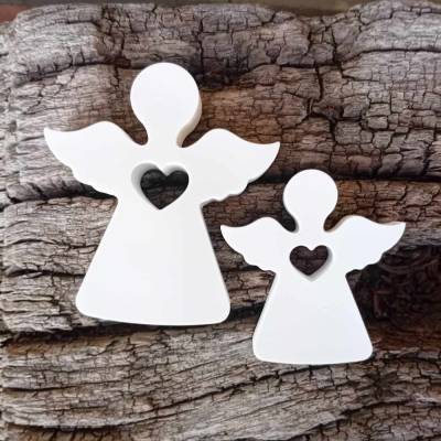 Gipsfigur Engel mit Herz aus Kunststein in zwei Größen