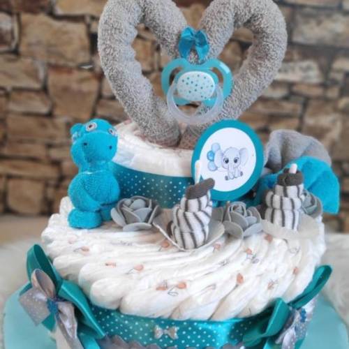 Windeltorte Mädchen/Junge türkis und grau mit  Dino aus Baby Waschlappen und Herz Schnuller